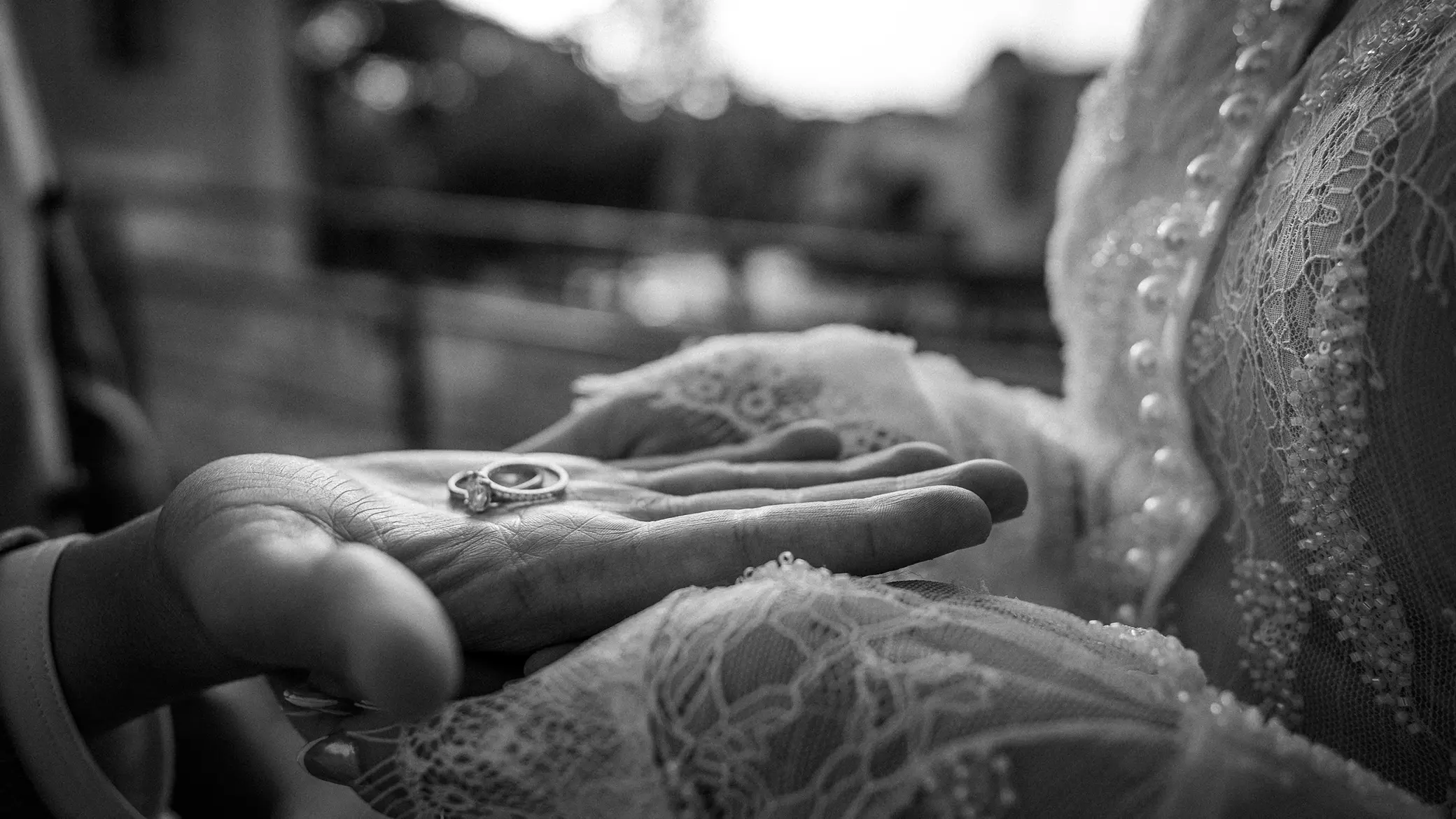 groom holding the proposal ring